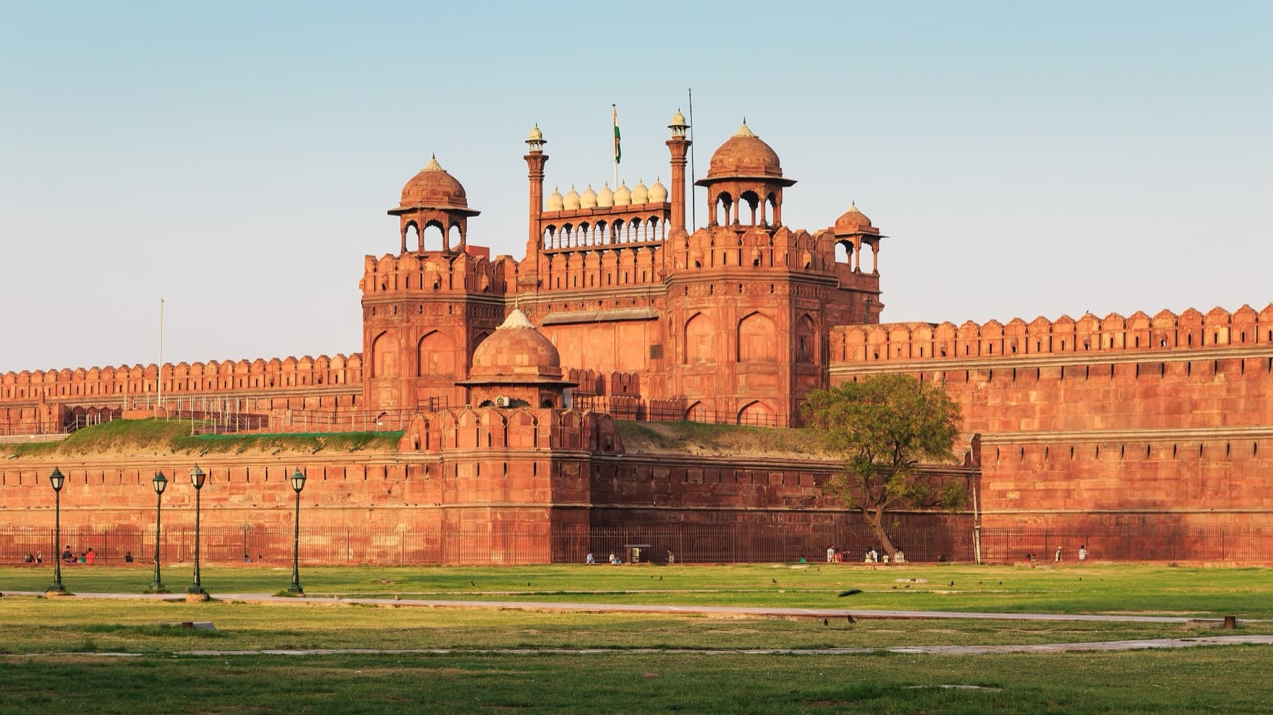 The fort lit from the exterior at night